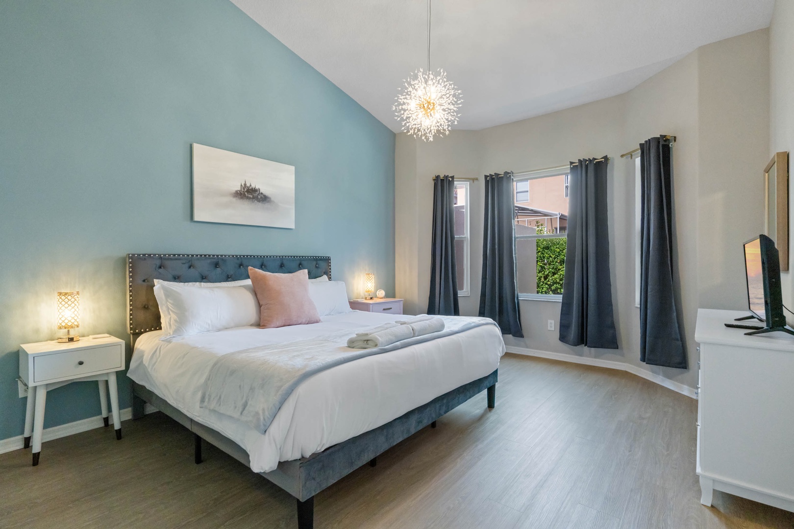 Feel swept away in the Master Suite, offering a King Bed, En Suite, and Smart TV
