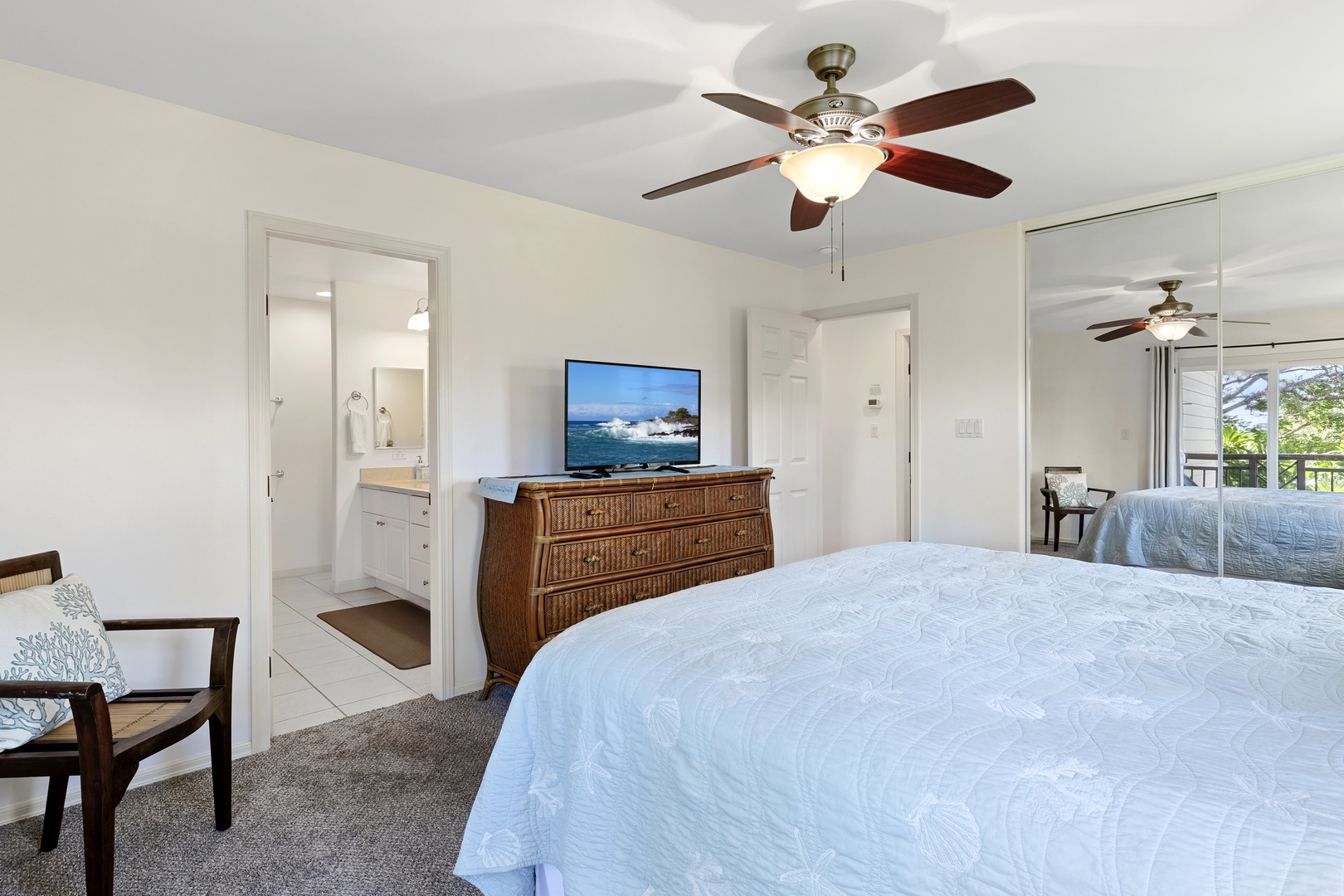 Bedroom #1 with king bed, attached en-suite bathroom and lanai access