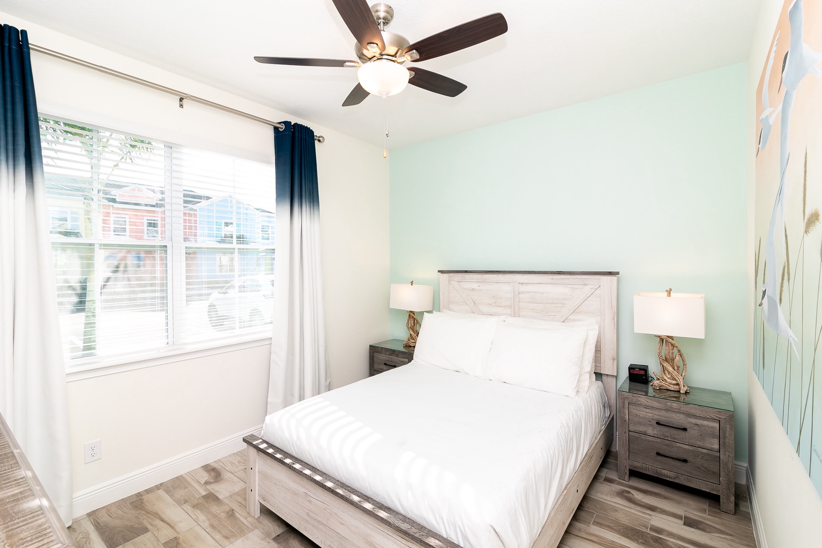 Bedroom 4: Escape to this First Floor Queen Bedroom with Smart TV and Ceiling Fan with remote