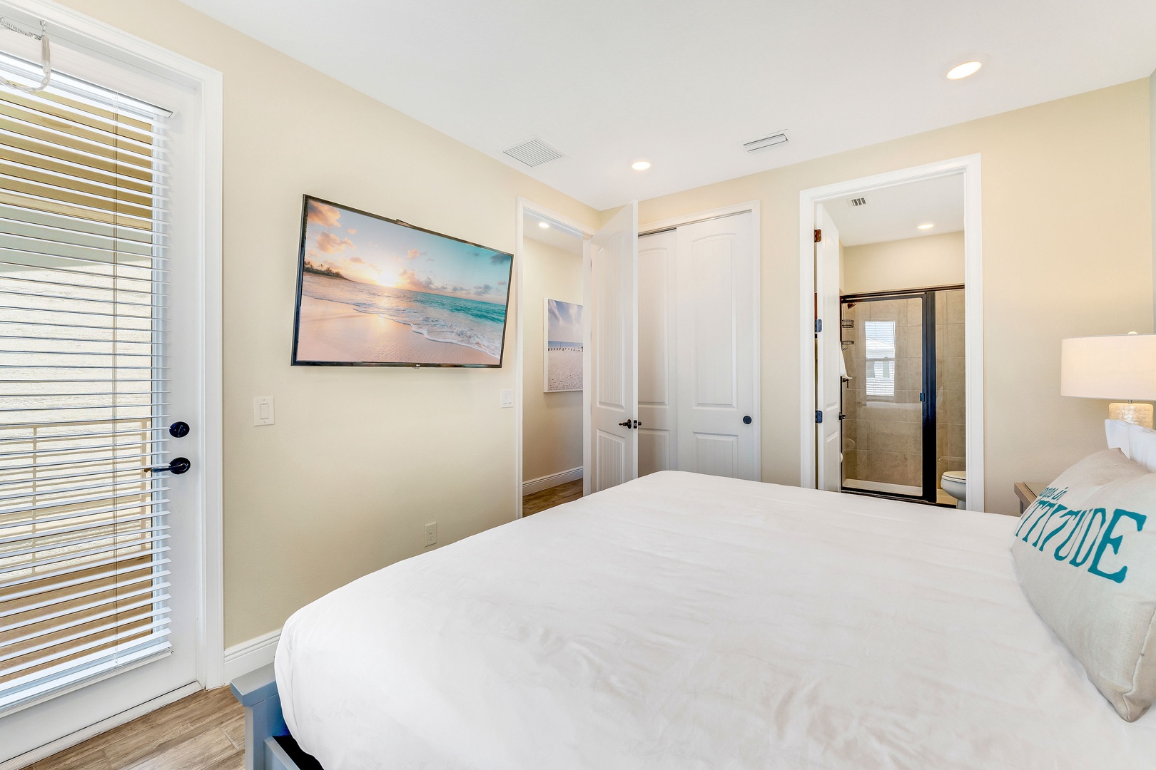 Bedroom 1 with King bed, balcony, Smart TV, and en-suite (2nd floor)
