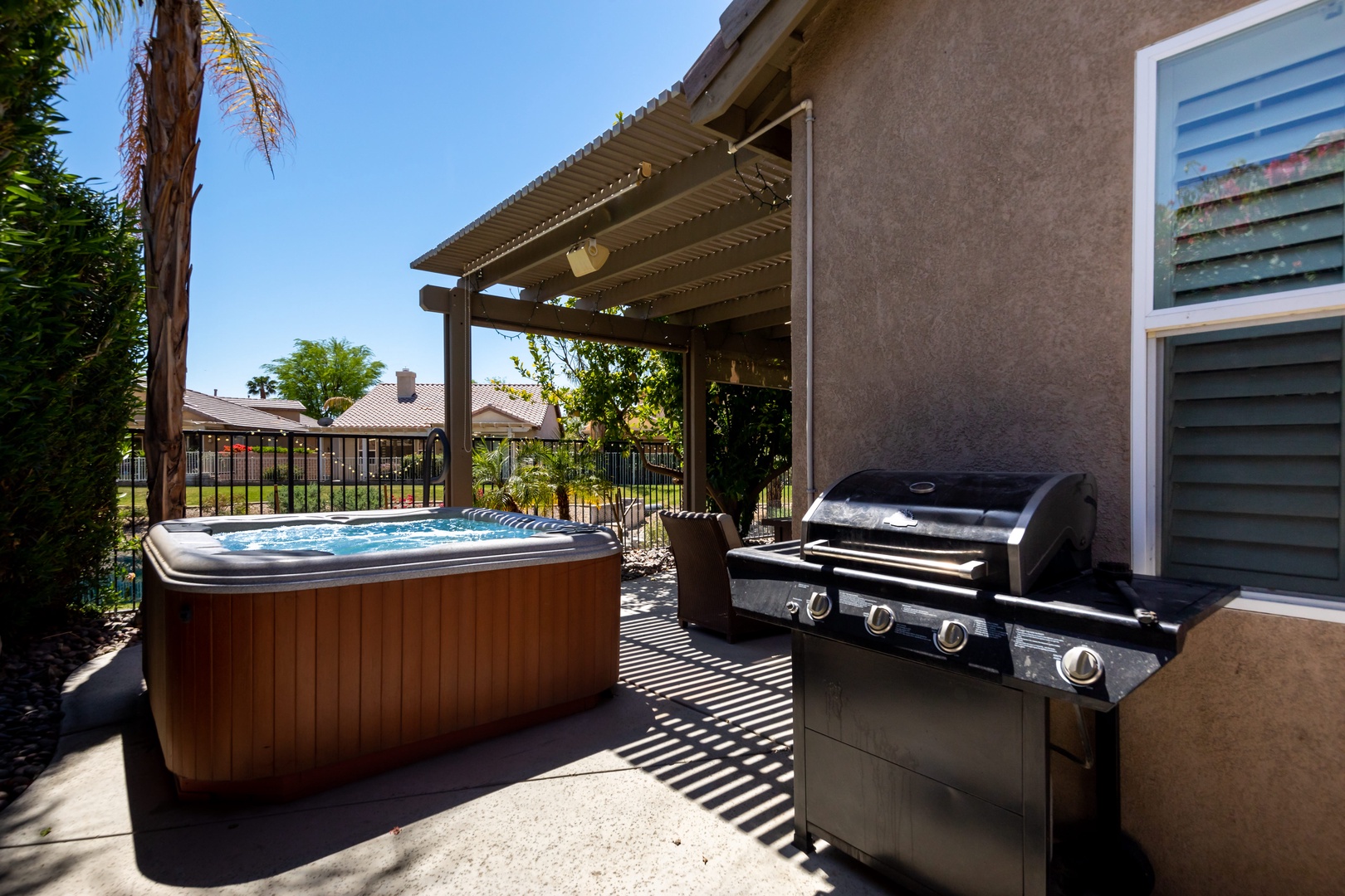 Hot tub with outdoor gas BBQ grill