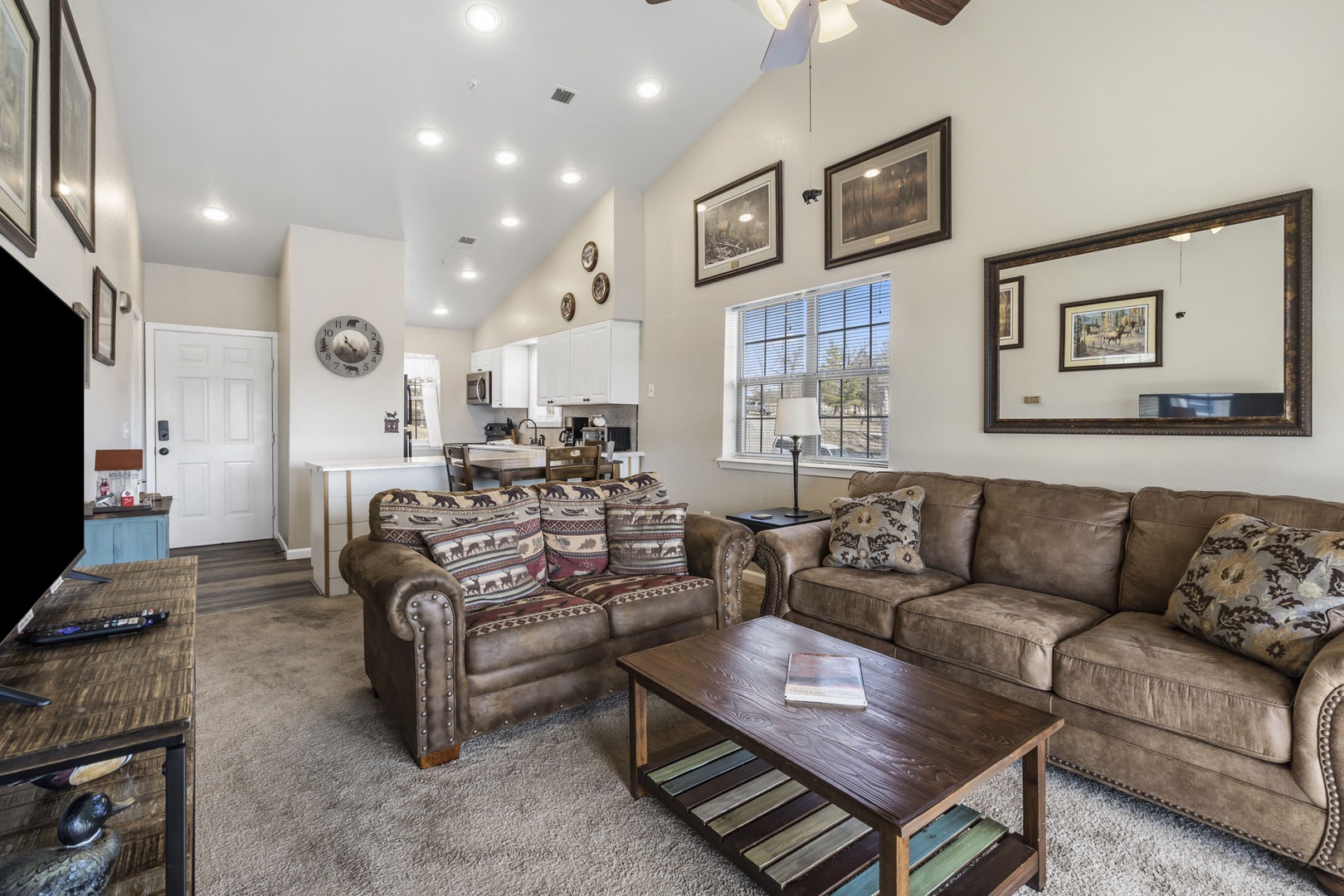 Cozy and spacious living area with TV
