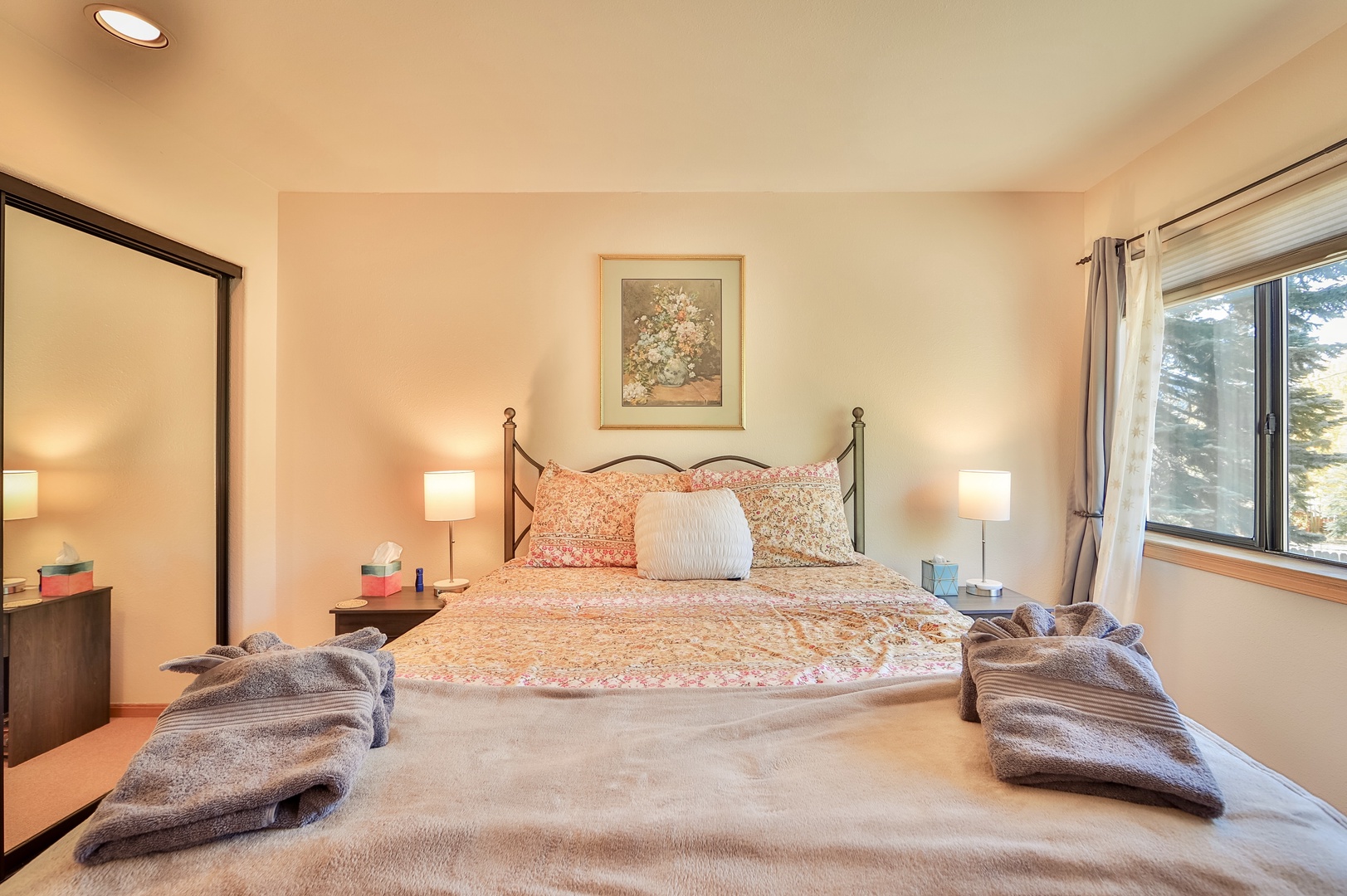 Recharge in this inviting queen bedroom