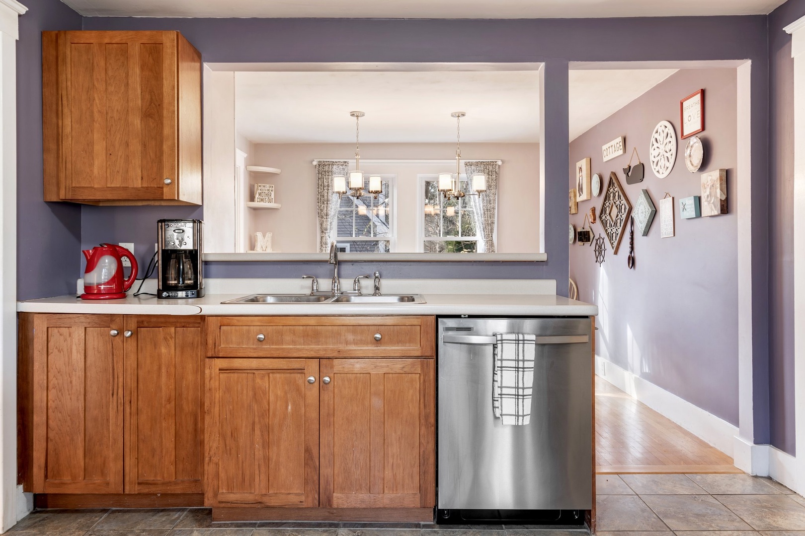 The open, airy kitchen offers ample space & all the comforts of home