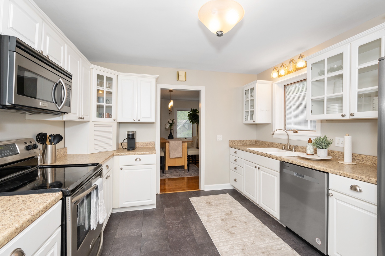 The updated kitchen is spacious & offers all the comforts of home