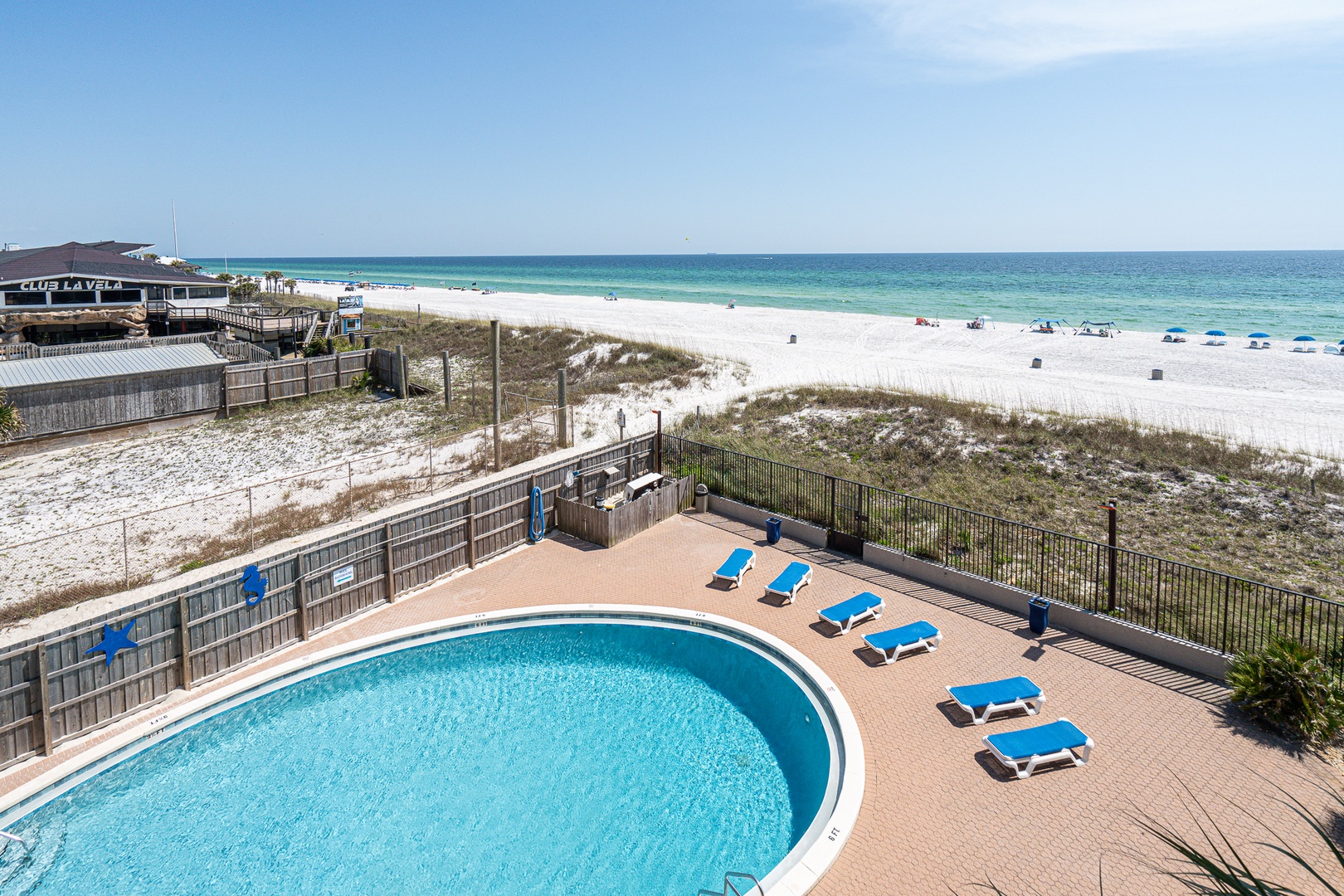 Indulge in the complex amenities and soak in the breathtaking beach view.