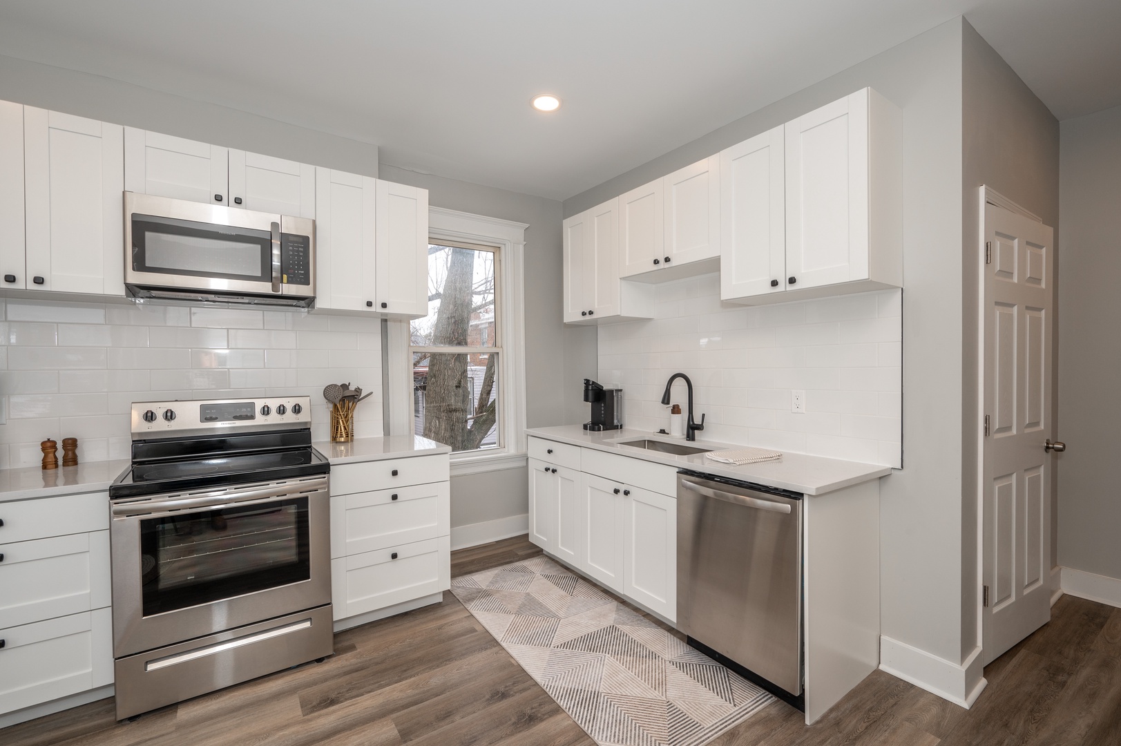 Apt 2 – The eat-in kitchen offers ample space & all the comforts of home