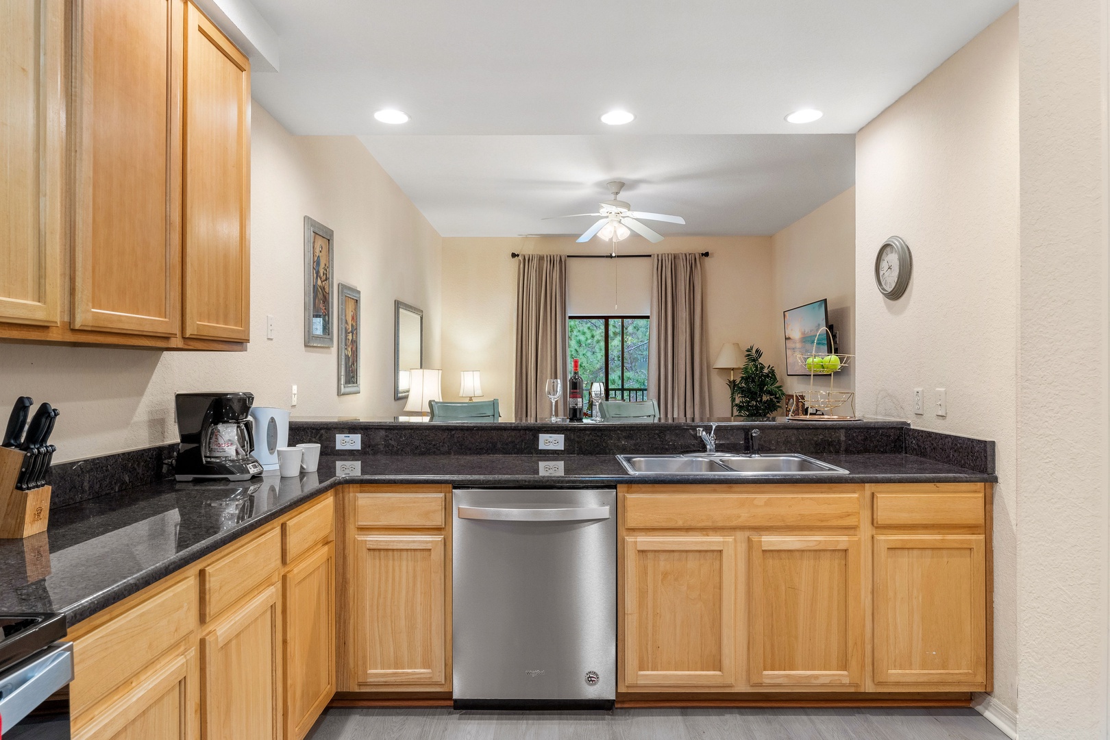 The open, airy kitchen offers ample space & all the comforts of home