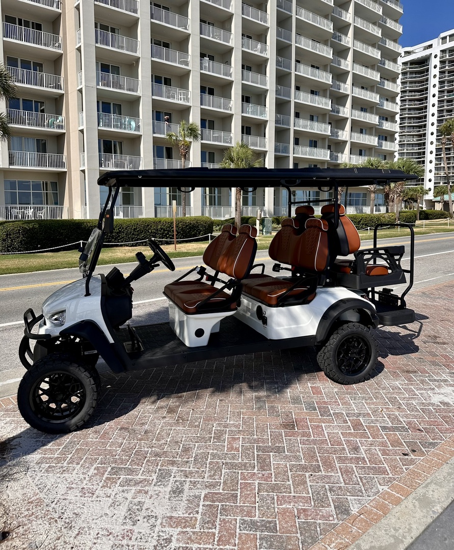 Brand-new 6-person golf cart loaded with features of a radio, Bluetooth connection compatible with Android Auto and Apple CarPlay, front and rear cameras, a 12V outlet, as well as USB and USB-c ports.