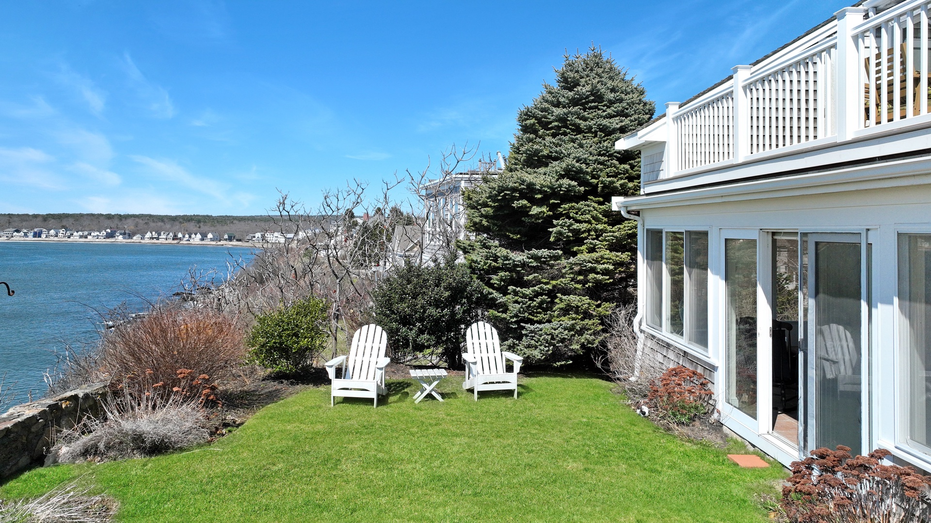 Back yard with outdoor seating and stunning ocean views