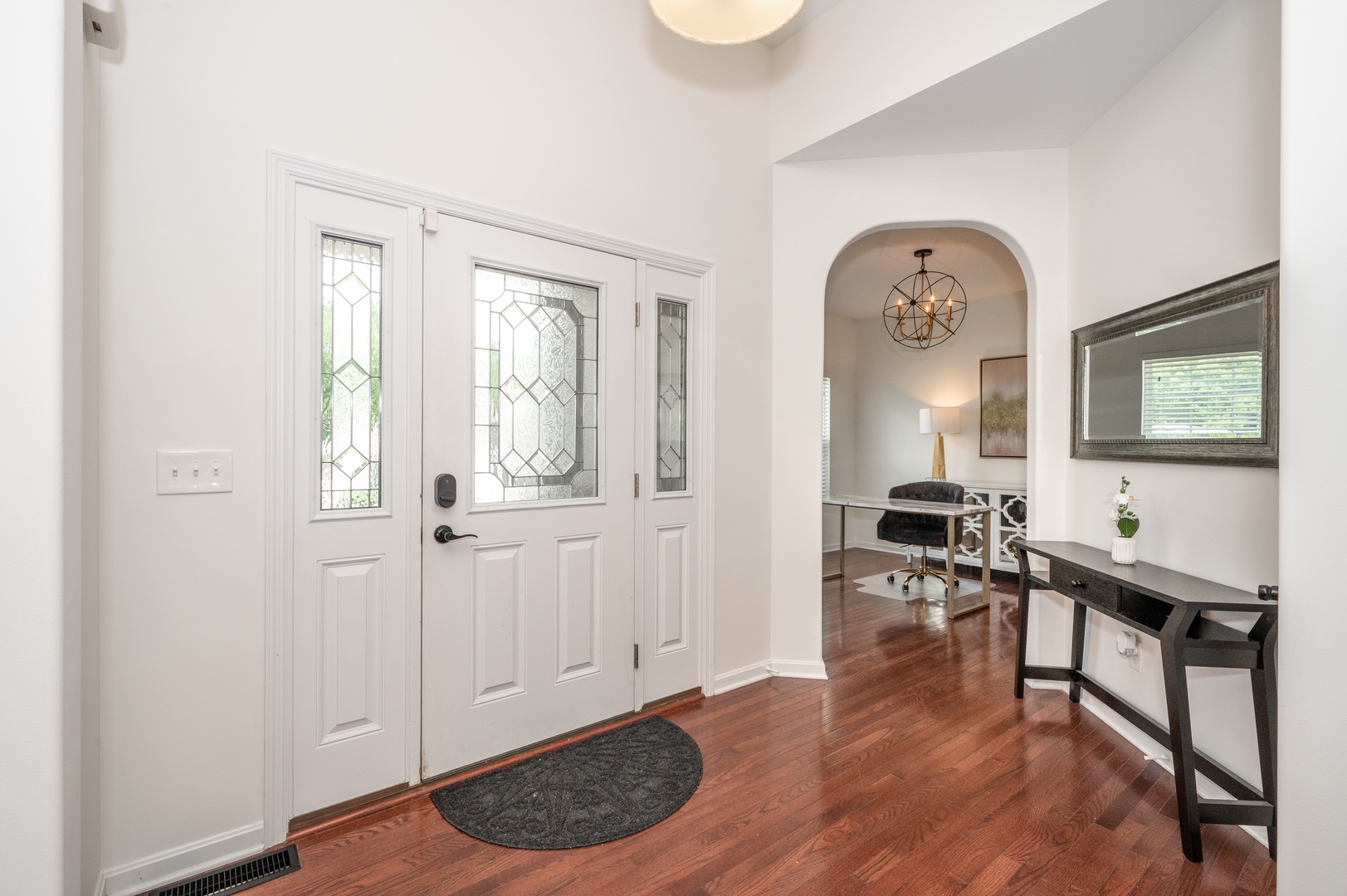 A spacious, airy entryway will welcome you home