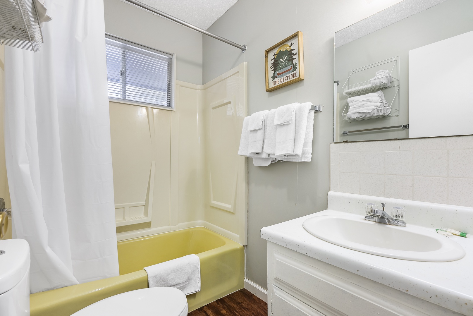 Full shared bathroom with shower/tub combo