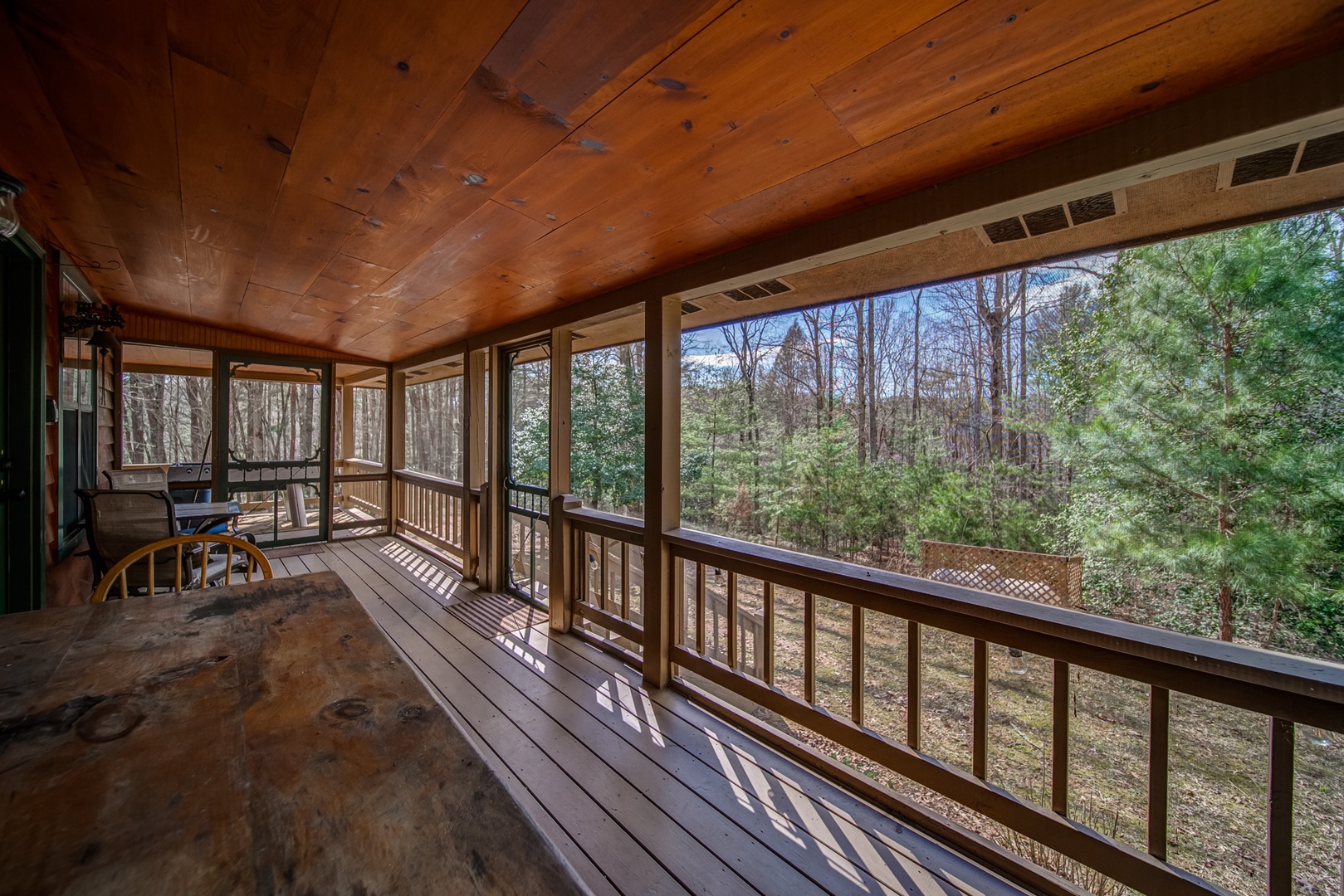 Gorgeous nature views will delight from the comfort of the screened porch