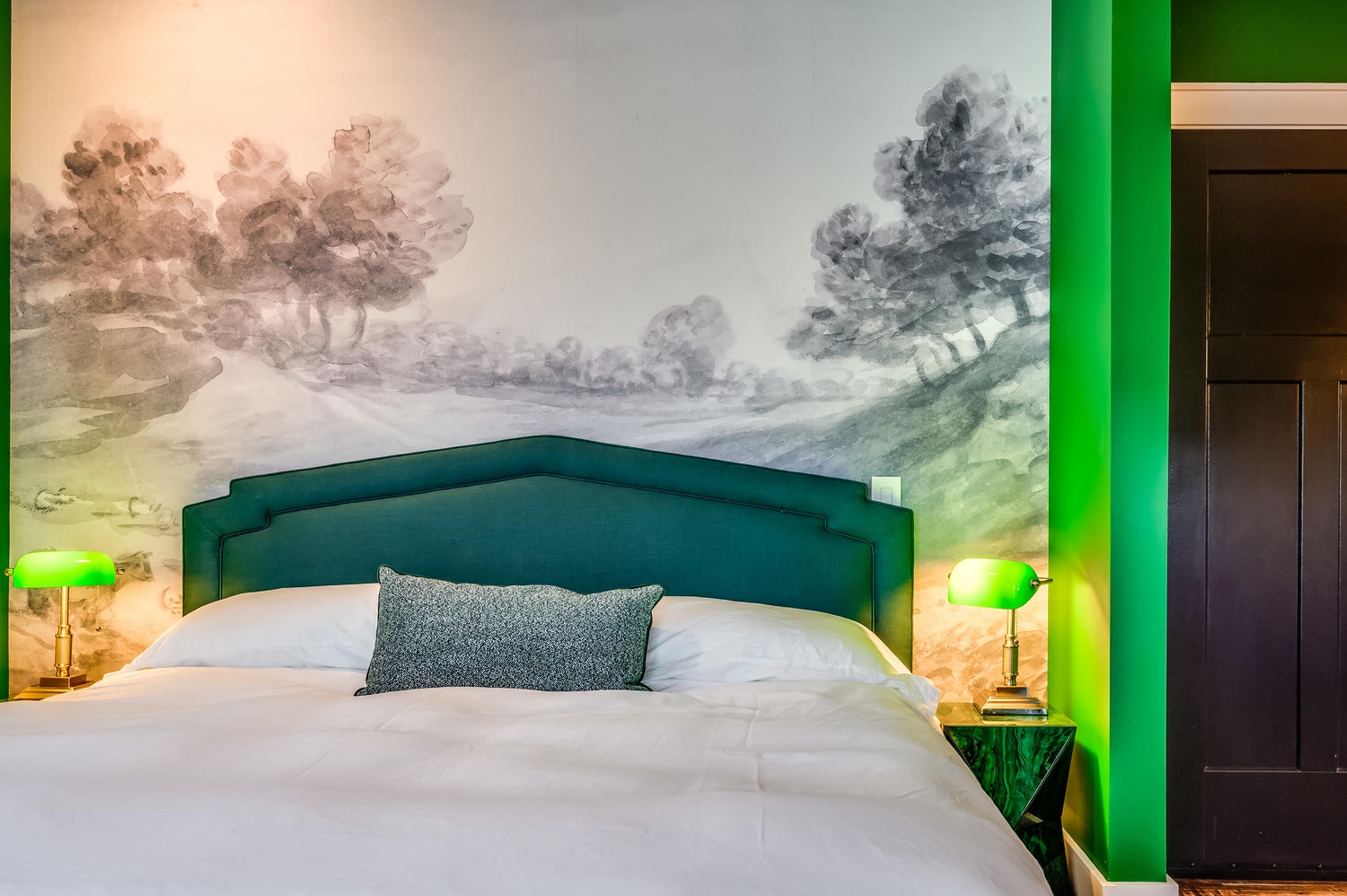 Suite 204 – The 2nd Floor Green Four-Poster Suite offers two Casper King Beds, 2 Smart TVs, and En Suite Bathroom