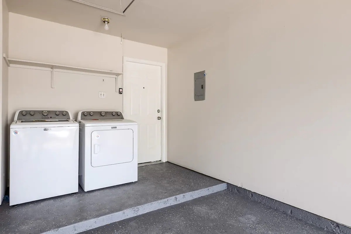 Private laundry is available for your stay, tucked away in the garage