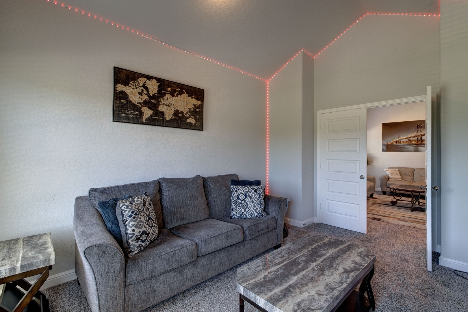 Bonus room with comfy sofa and Smart TV