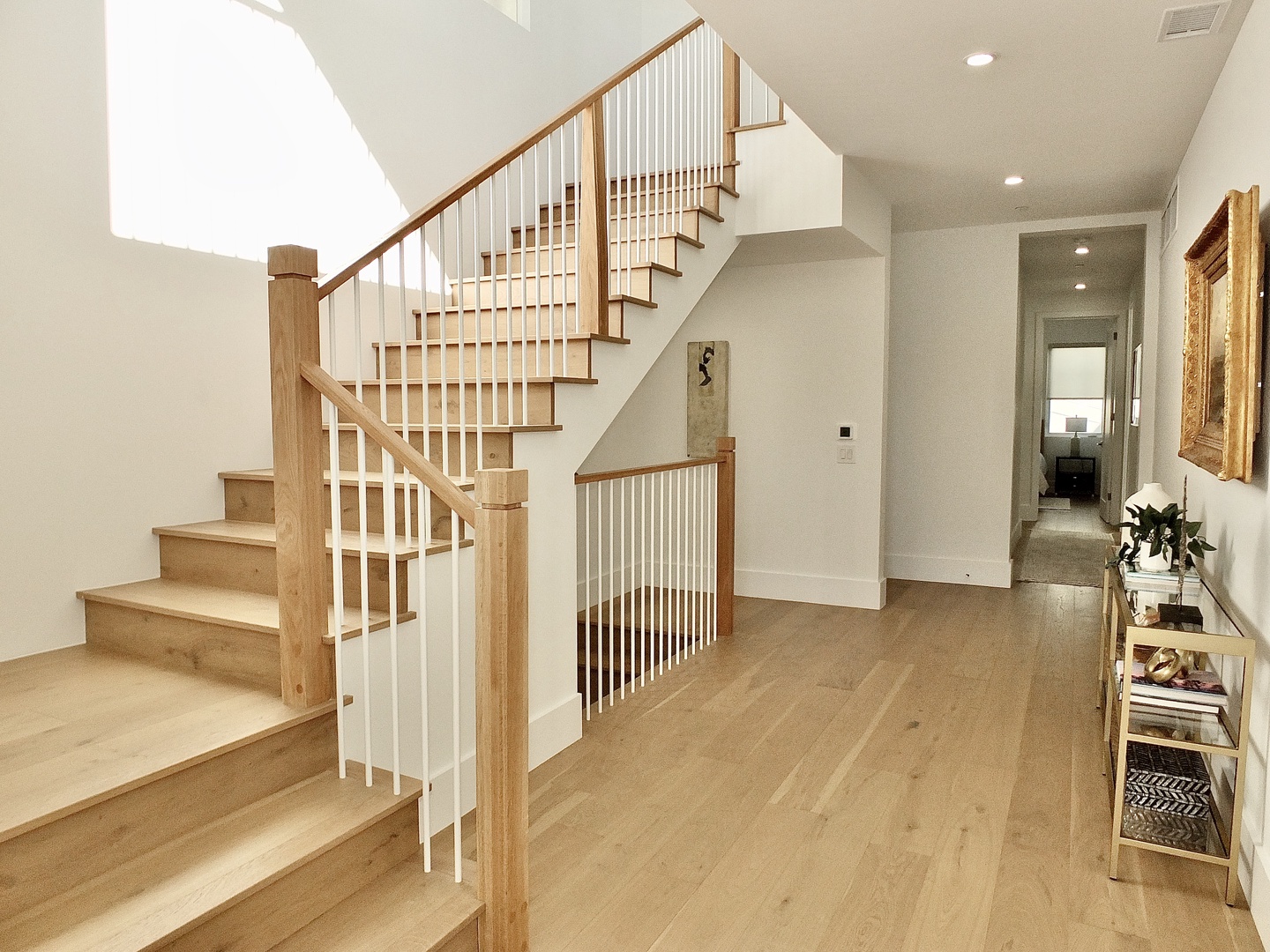Ascend the breezy staircase to find the spacious third level