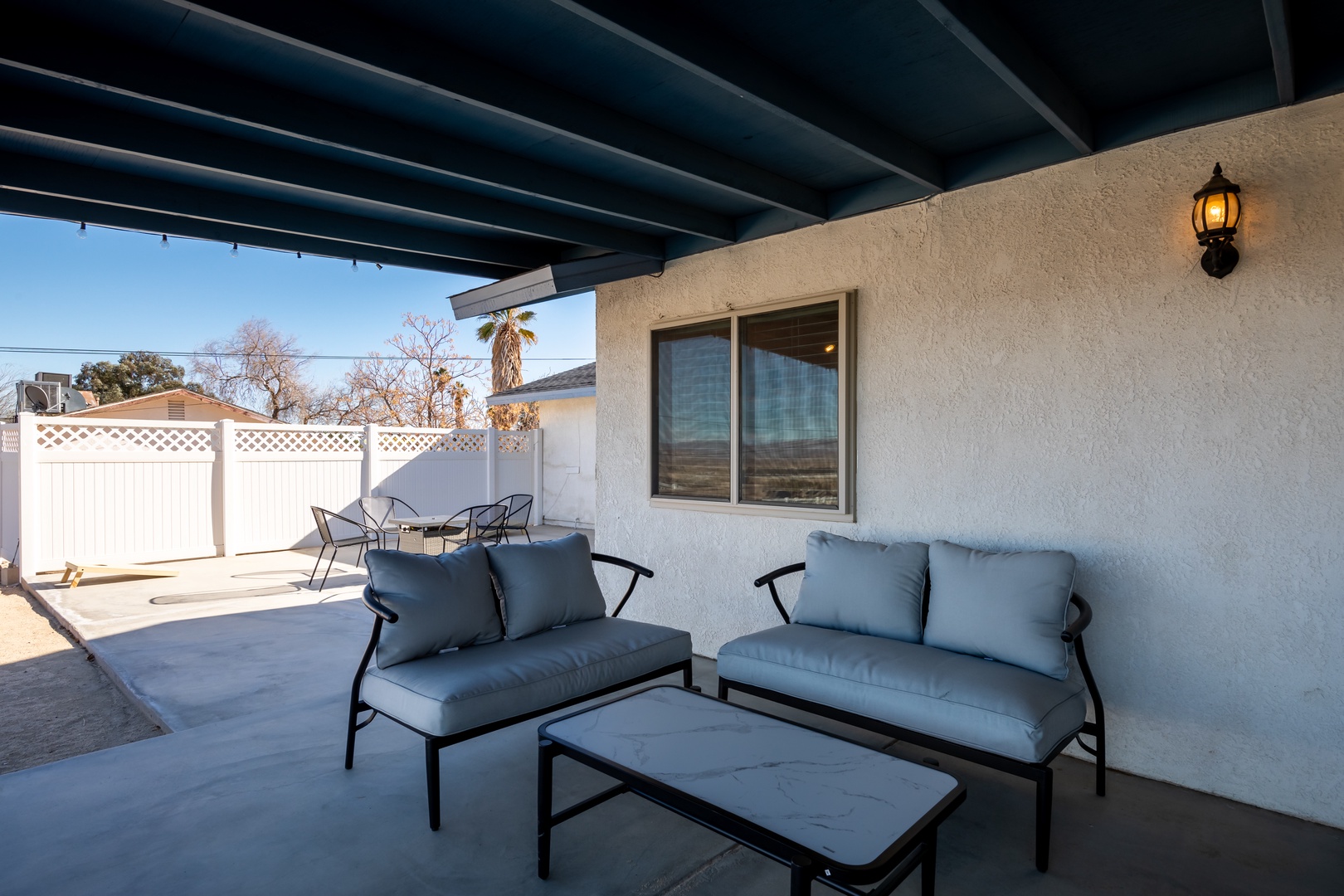 Gazebo with ample outdoor seating by the pool