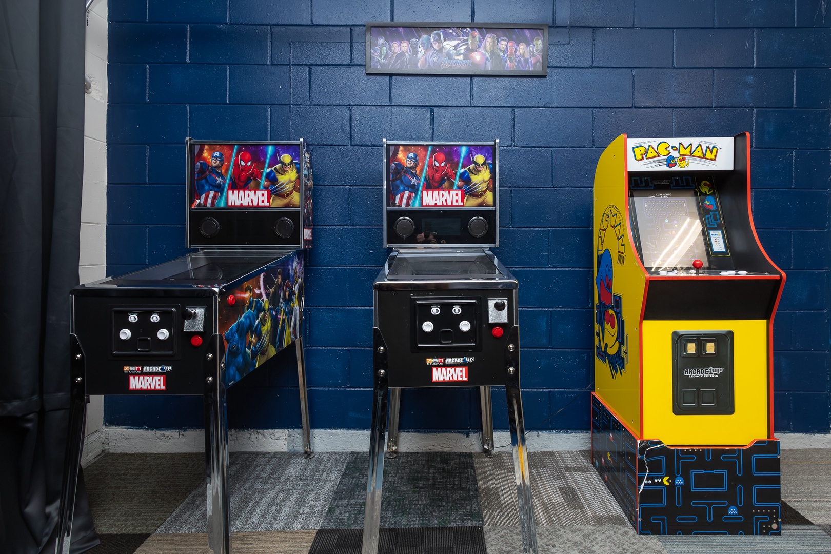 Marvel-themed game room fun: Pac-Man, foosball, and ping pong