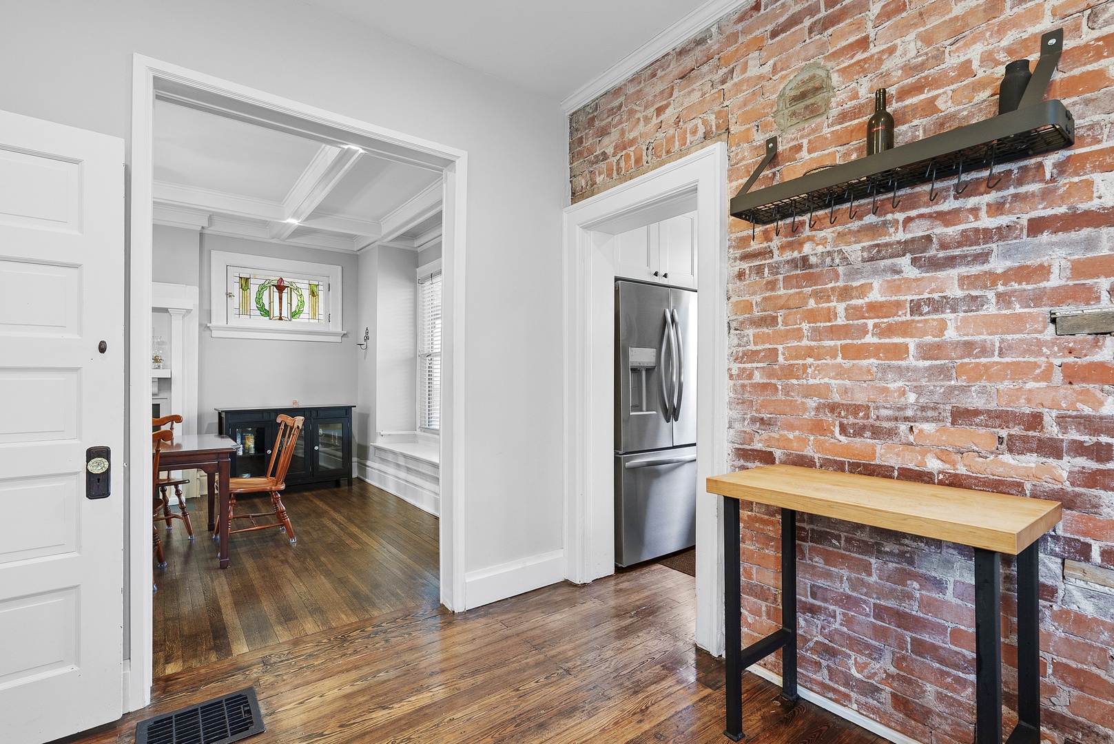 The bright, updated kitchen offers ample space & all the comforts of home