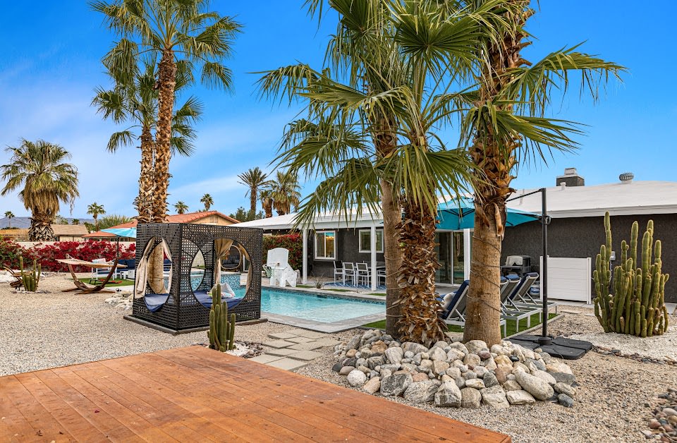 Instagrammable pool with Basketball hoop, lounge chairs, day bed, outdoor dining