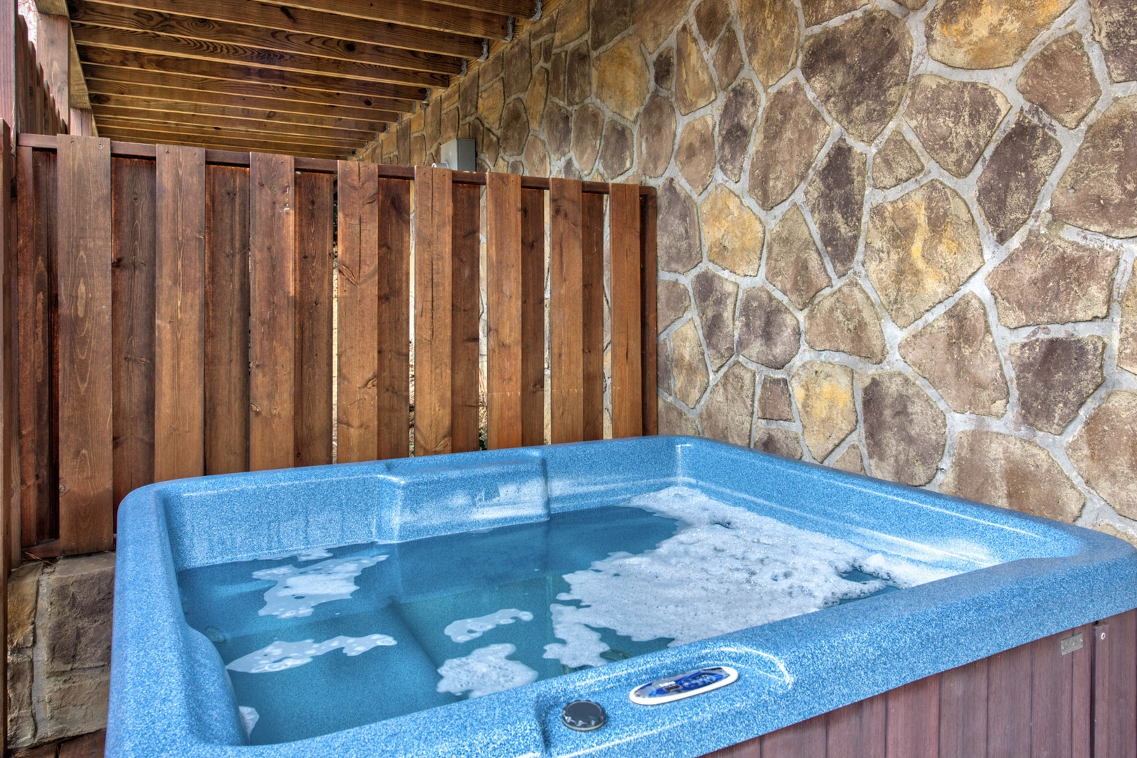 Relax and unwind in the private hot tub