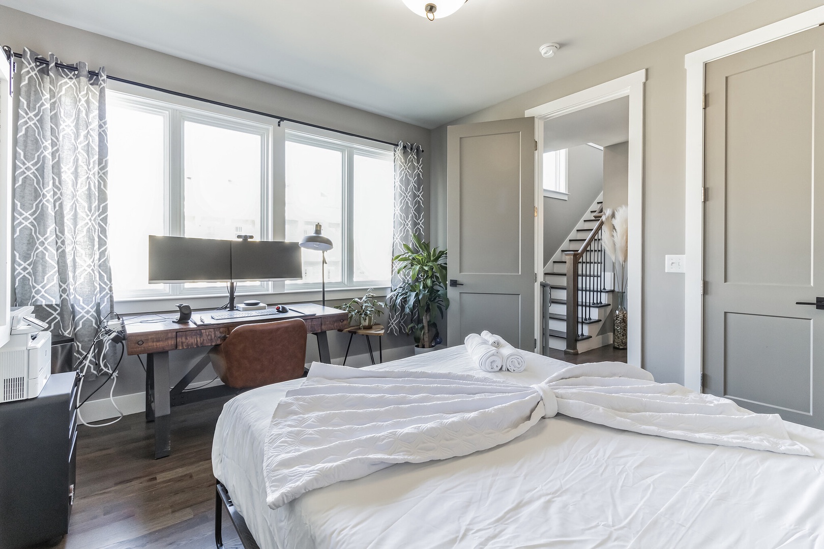 This 1st-floor suite offers a queen murphy bed, private ensuite, & desk space
