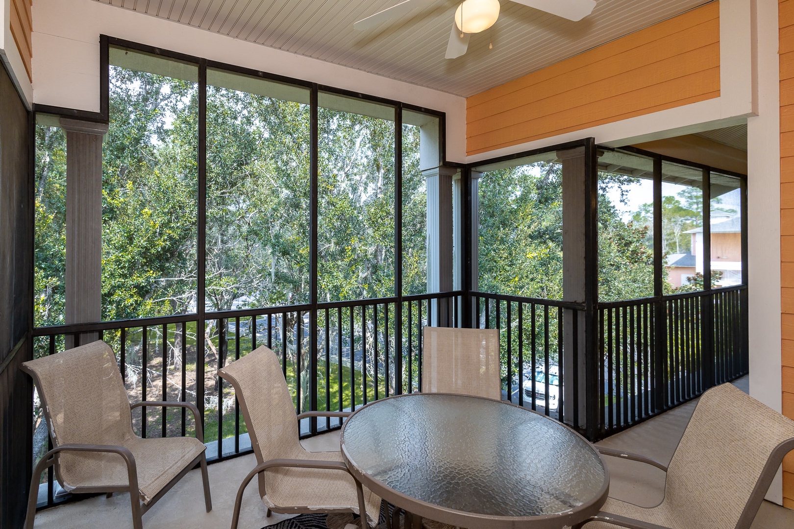 Screened in porch with ample seating