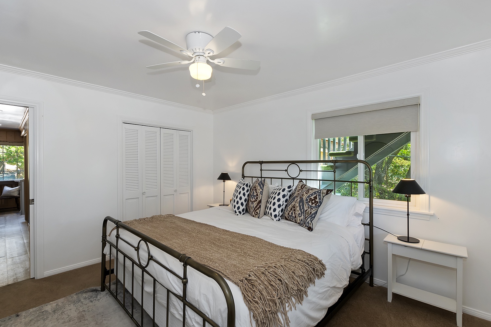 Bedroom 1 with king bed, and deck access