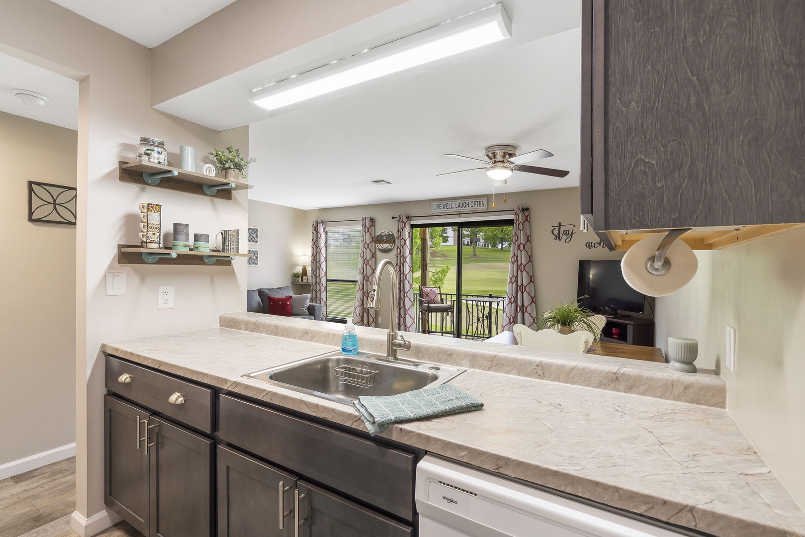 The open, airy kitchen offers ample space & all the comforts of home