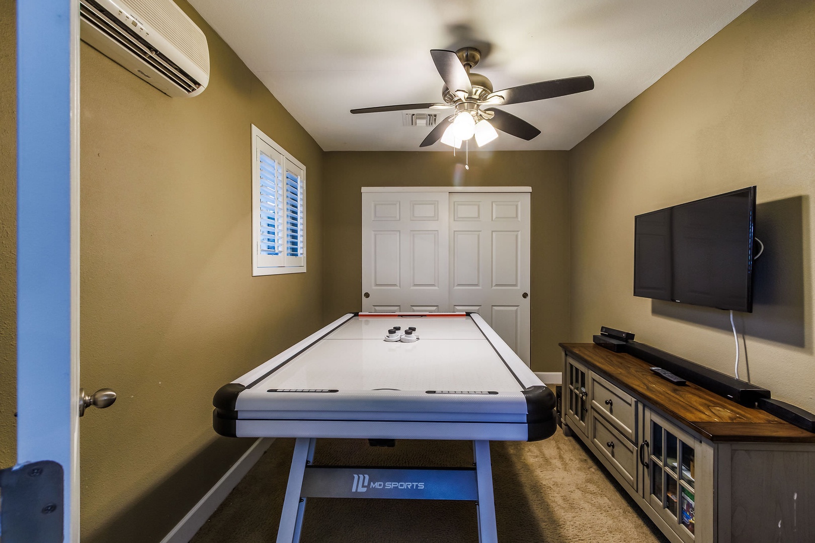 Game room features air hockey