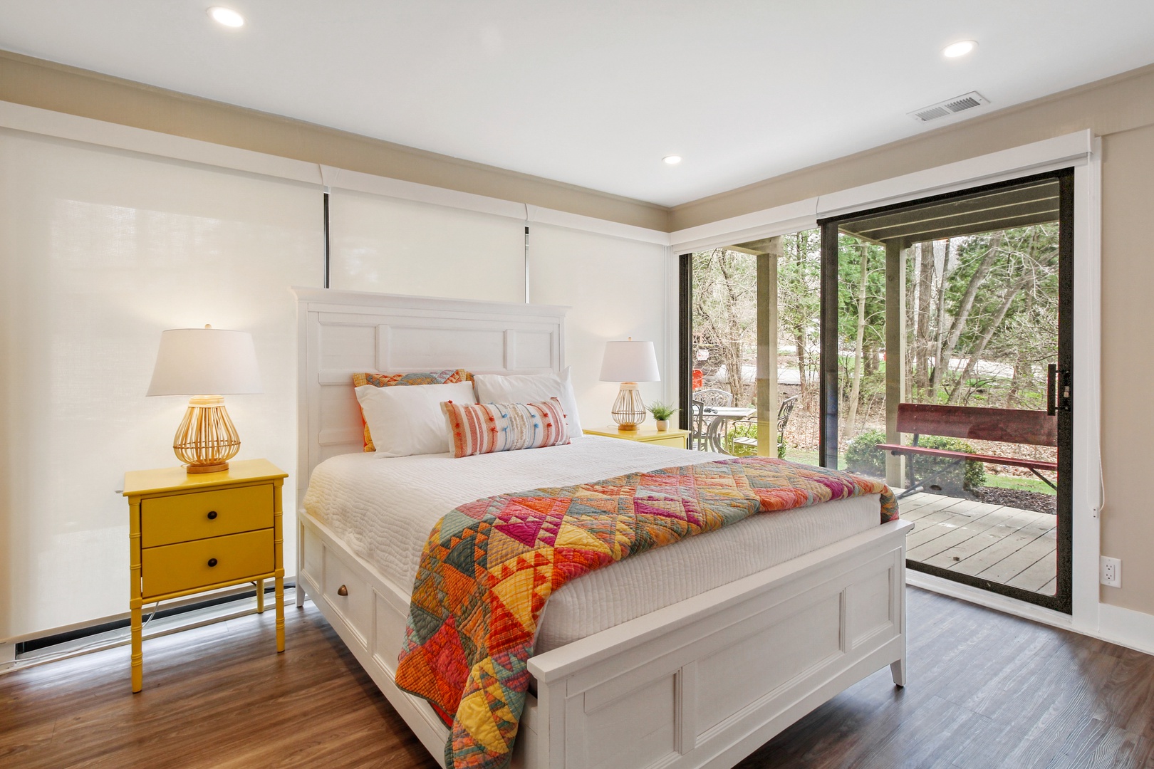 The second bedroom retreat includes a queen bed & deck access