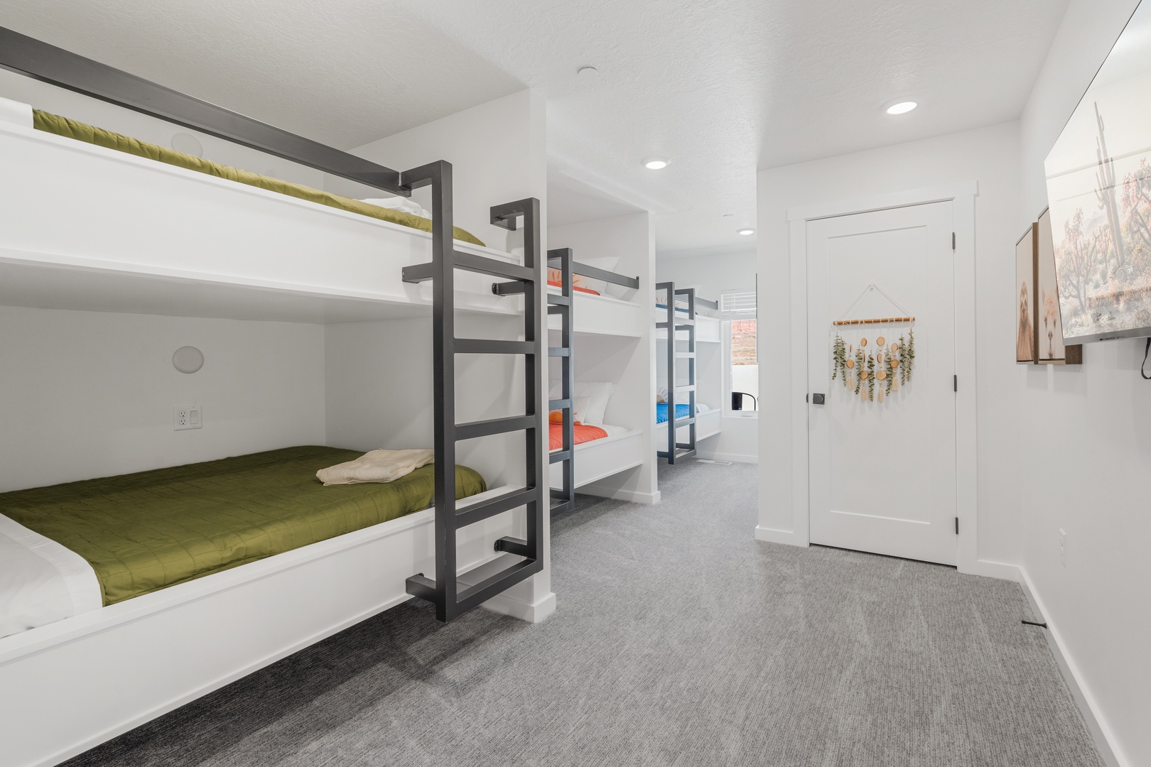 The 3rd-floor bunk suite, with full-over-full & twin bunks, ensuite, & smart TV