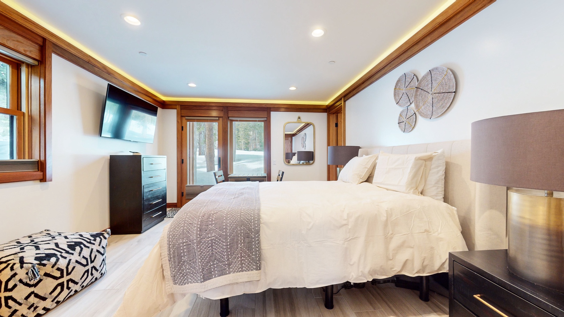 Bedroom 3 with queen bed, deck, Smart TV, and ensuite