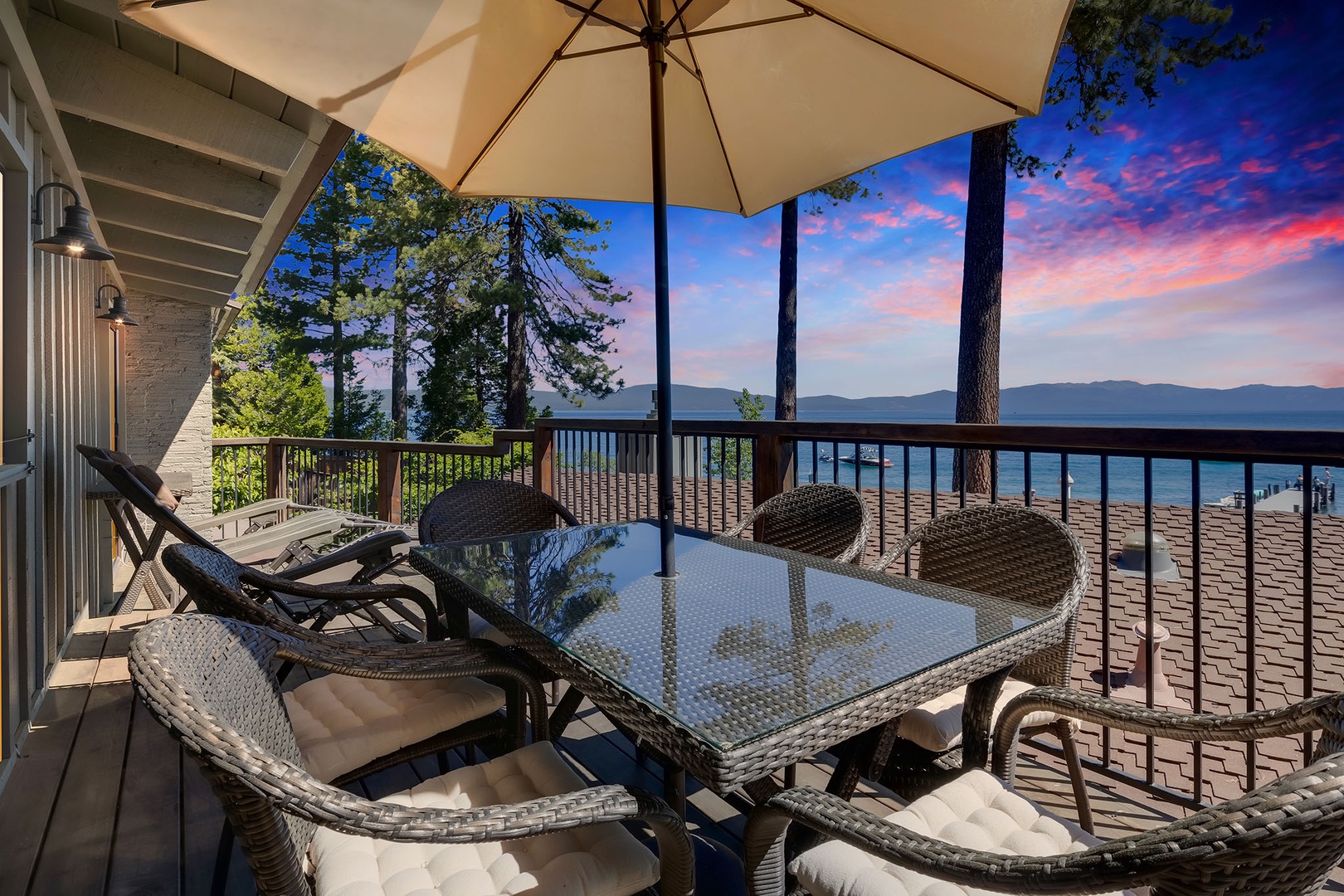 Lounge chairs and outdoor dining in the balcony