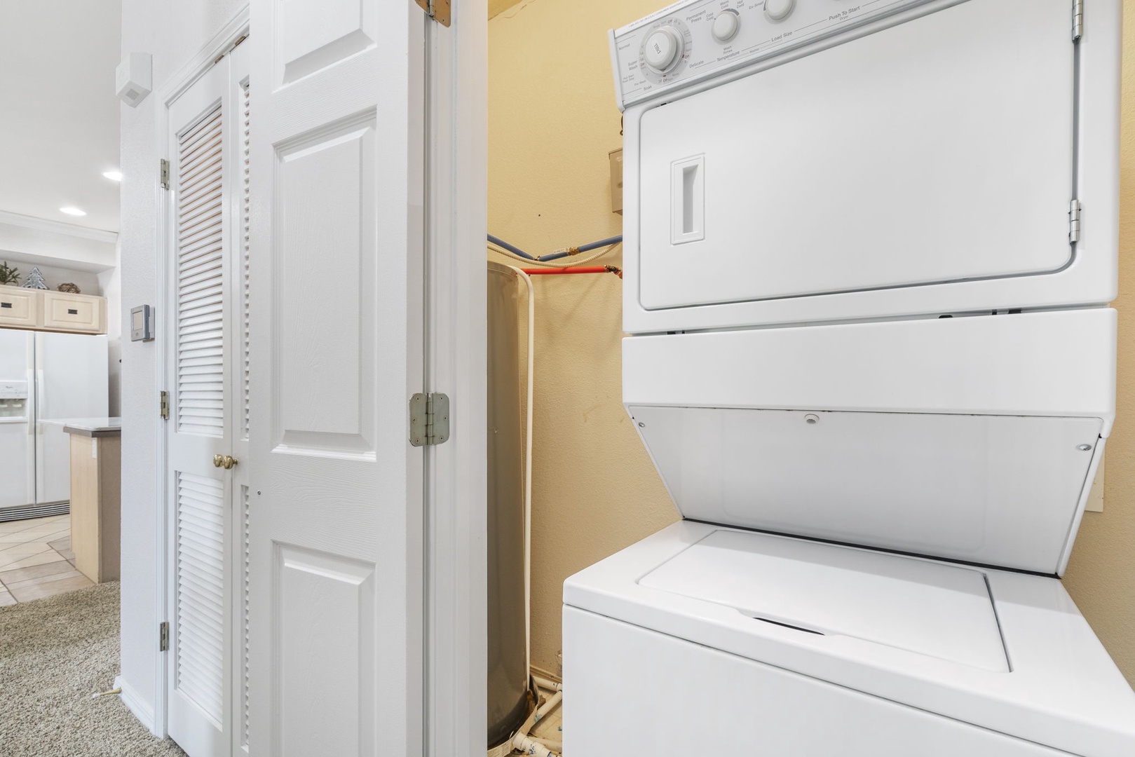 Private laundry is available for your stay, tucked away in a closet