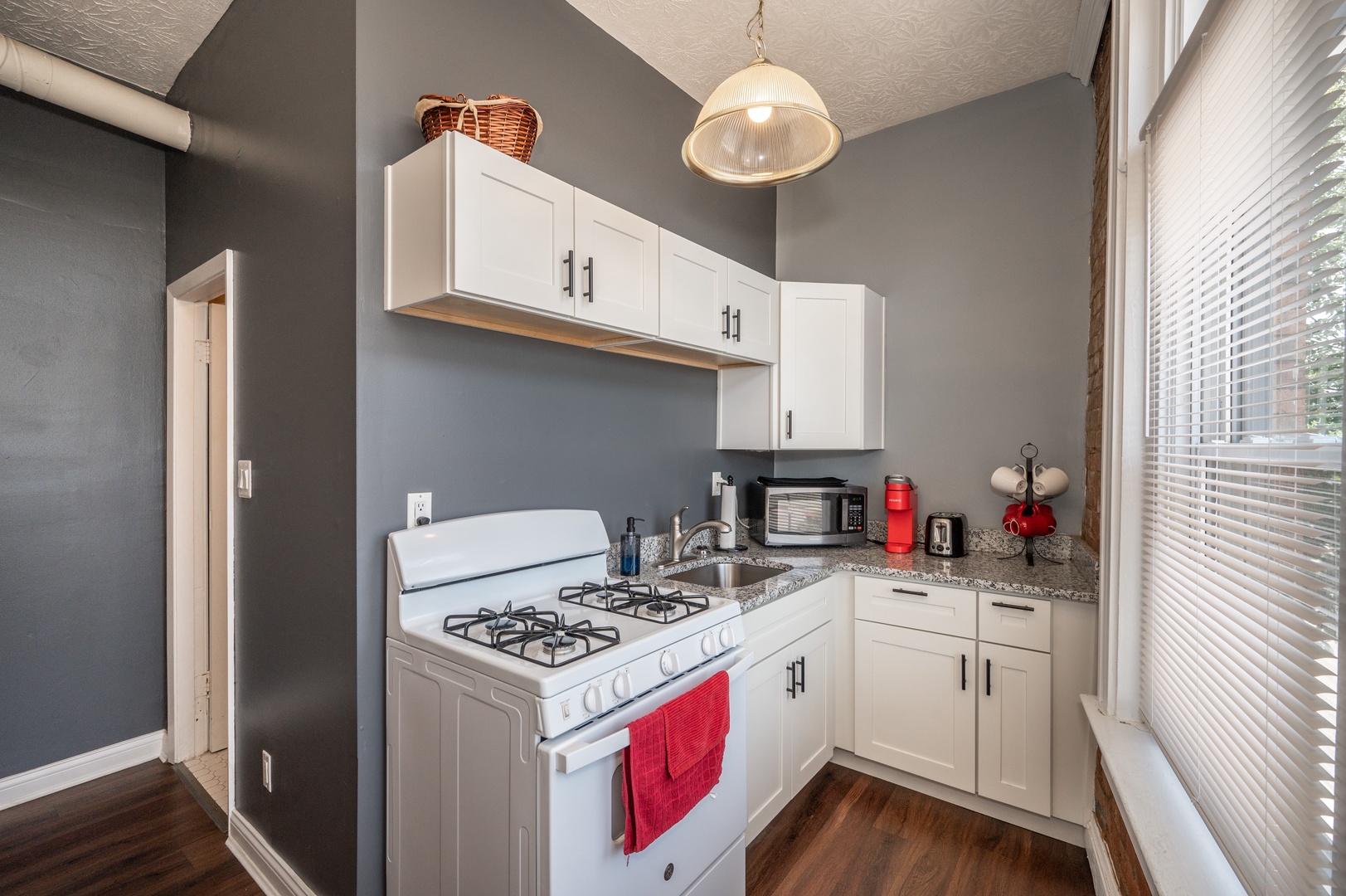 Monmouth Loft 1’s quaint kitchen is well-equipped for your stay