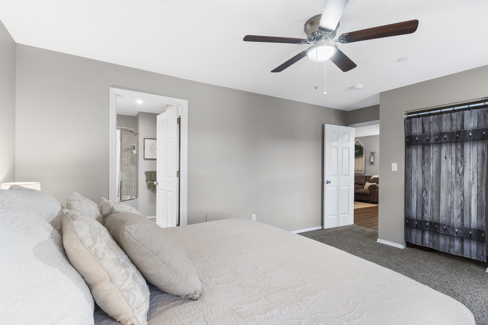 A plush king bed, private ensuite, & Smart TV await in this bedroom retreat