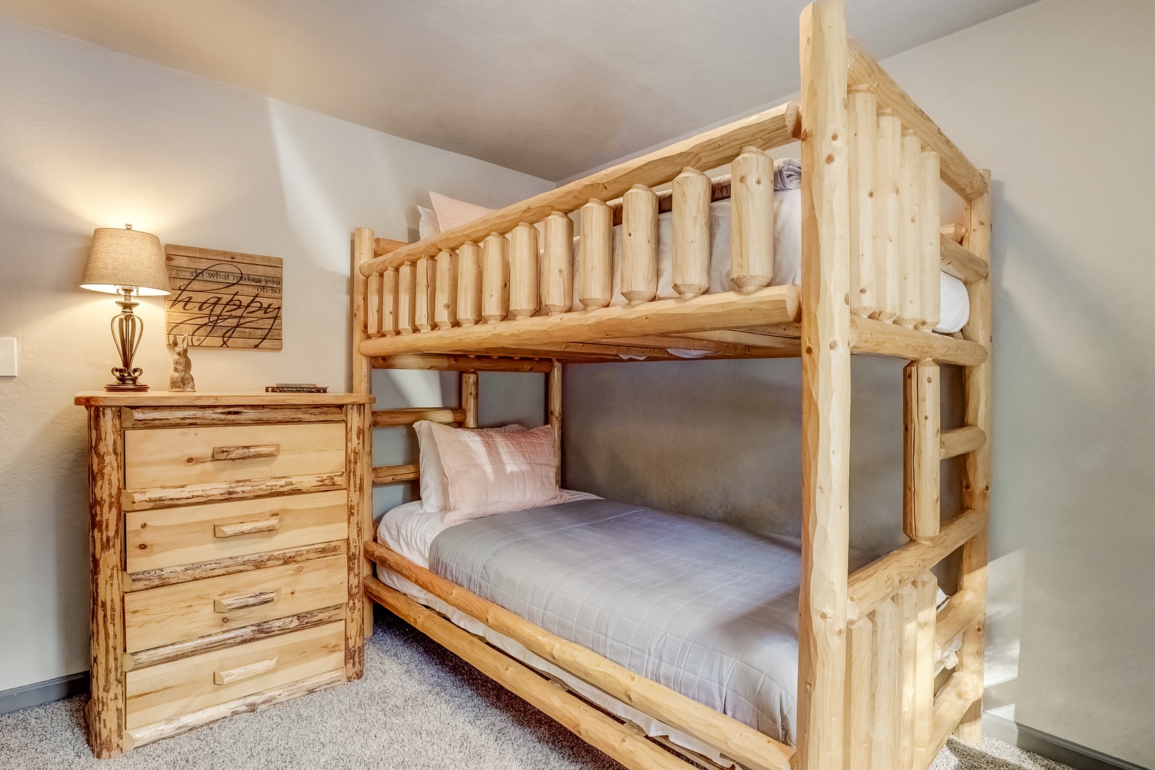 The cabin-style main level bunk room offers twin-over-twin bunks