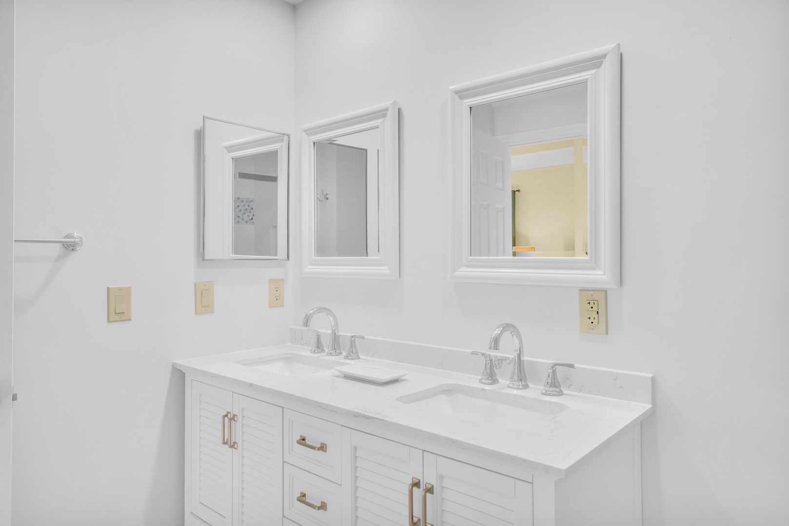 The private ensuite offers a double vanity & glass walk-in shower