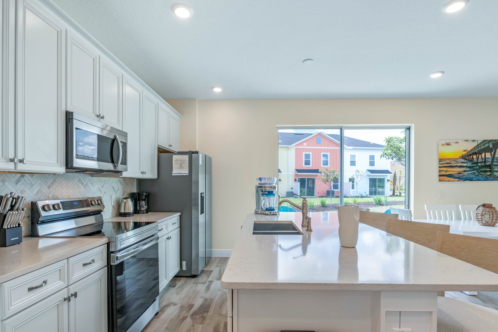 The Kitchen offers ample counter space with seating for 4 at the island
