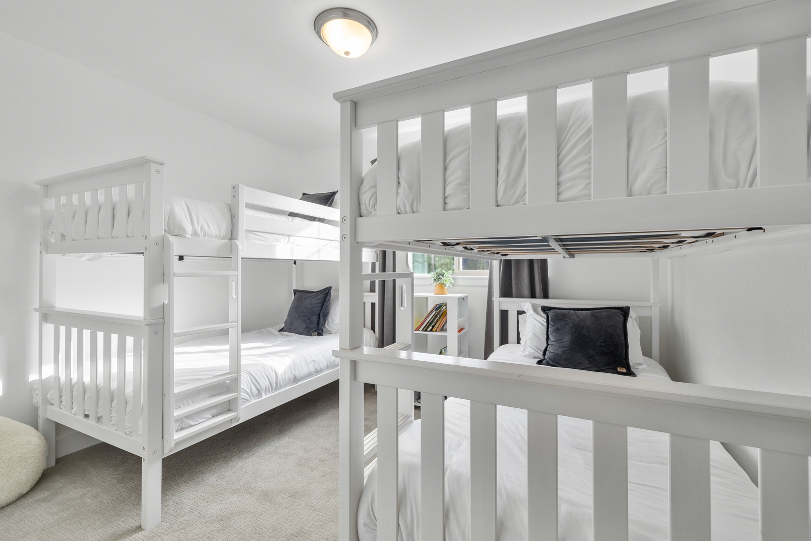 The final 2nd floor bedroom includes two twin-over-twin bunkbeds