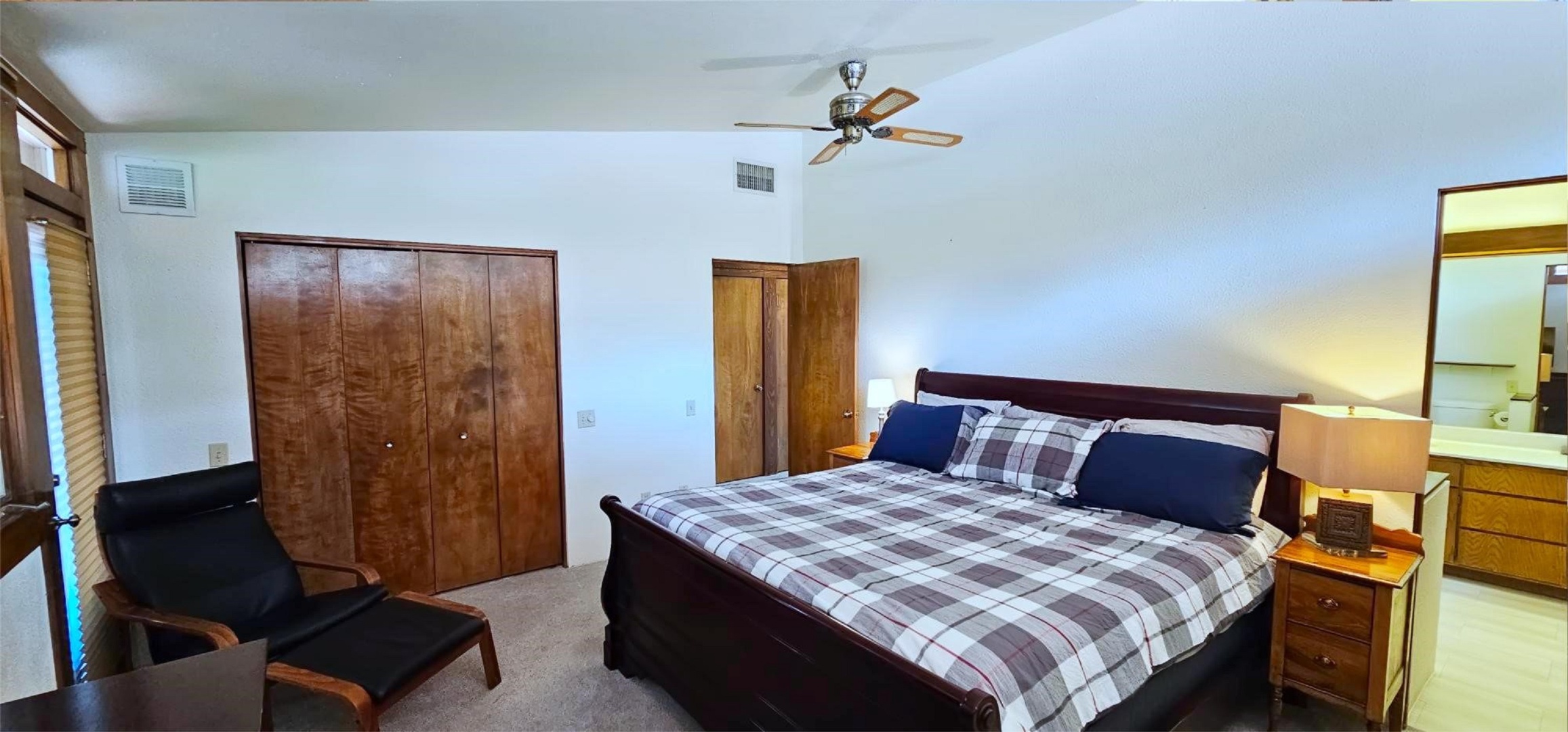 Bedroom 1 with king bed, Smart TV, and ensuite