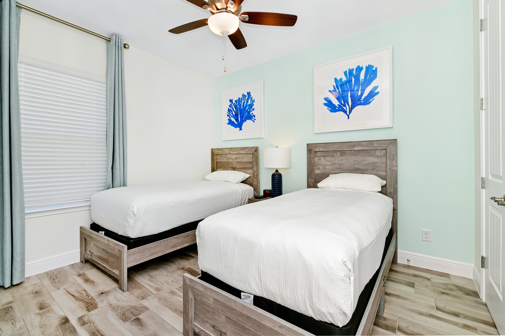 Coastal 2nd Floor double twin bedroom with ceiling fan
