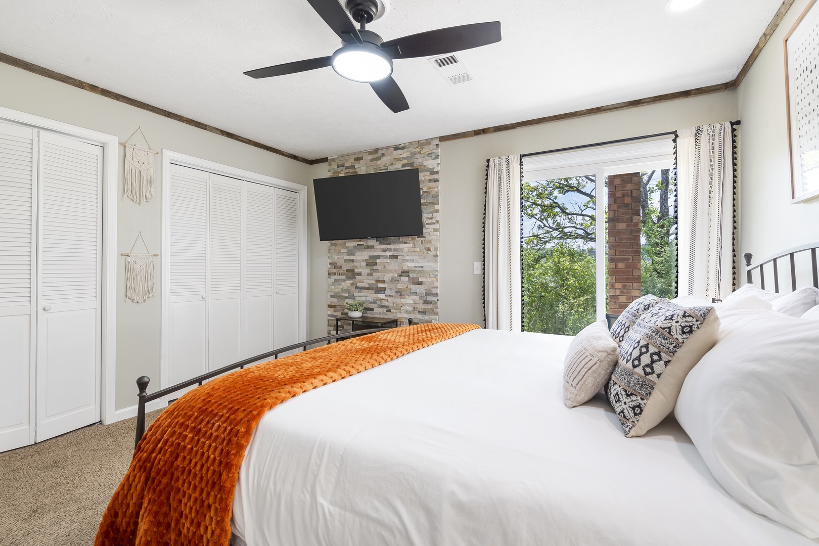 This serene suite boasts a plush king bed, ensuite, & Smart TV