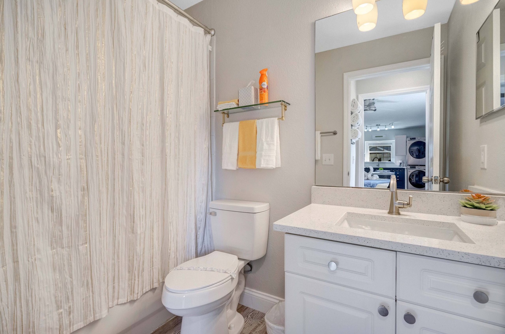 Studio full bath with a shower-tub combo and single vanity for your comfort