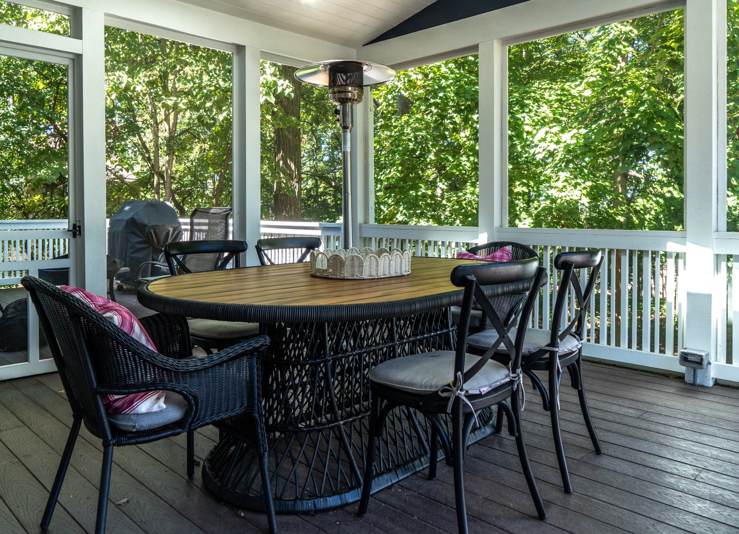 Enjoy a meal on the screened-in porch