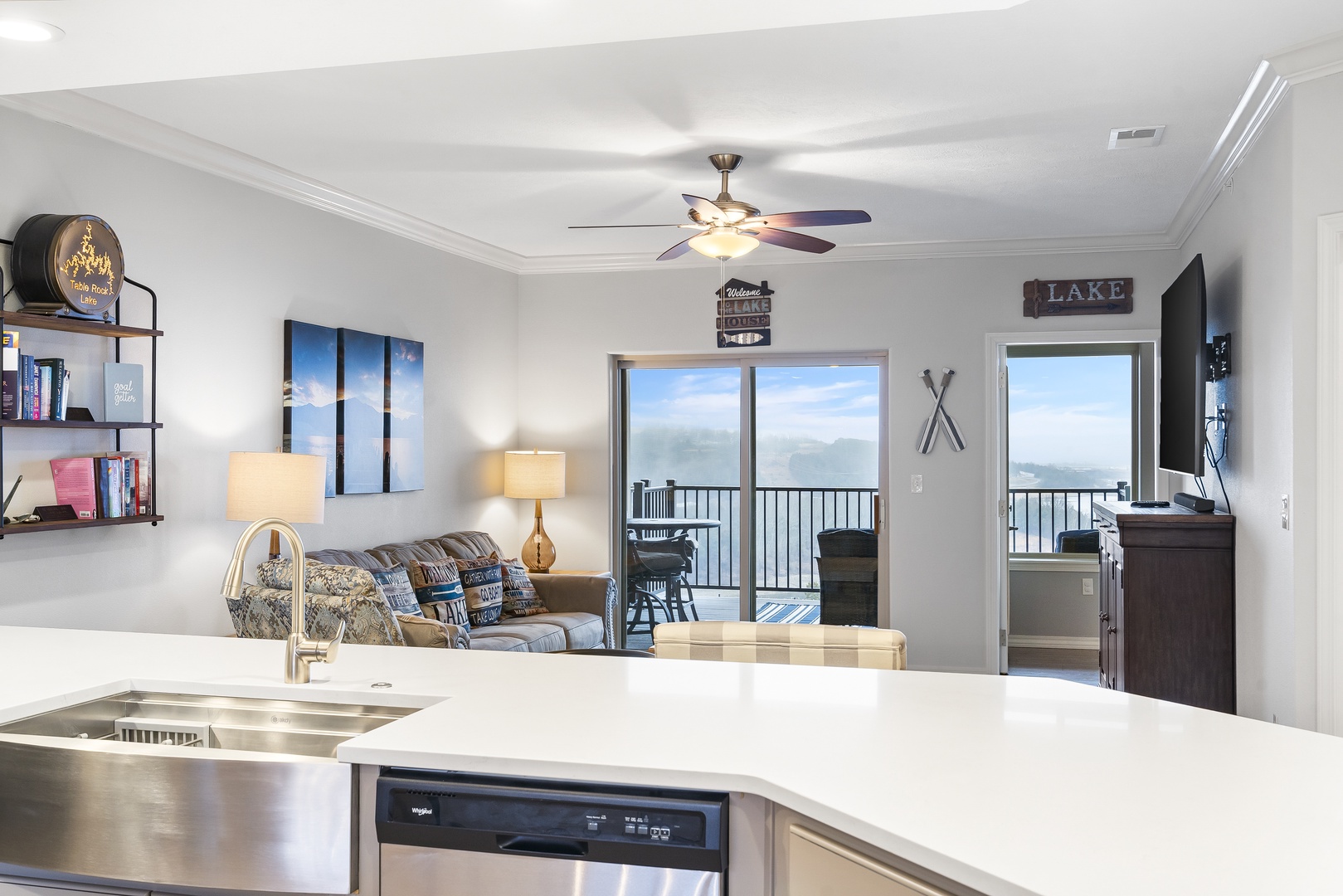 The airy kitchen features beautiful views, ample space, & all the comforts of home