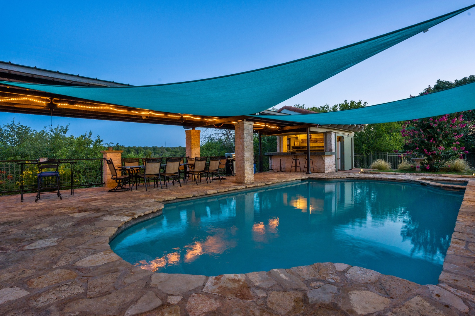 Private pool with outdoor dining and ample seating