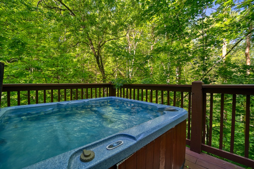 Soak the day away with treetop views in the bubbling hot tub